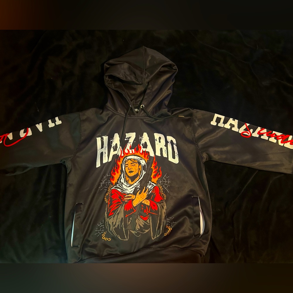 I am selling a black/red/white hoodie. It fits a medium but it’s a small
